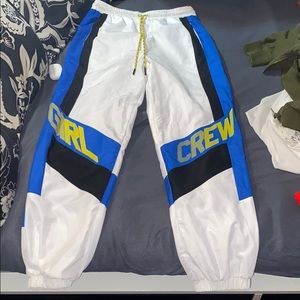 Blue, white, black, and yellow joggers.